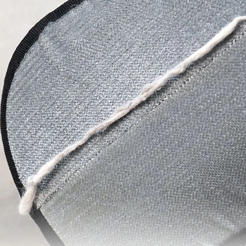 Hair caught on the grey side of the glove